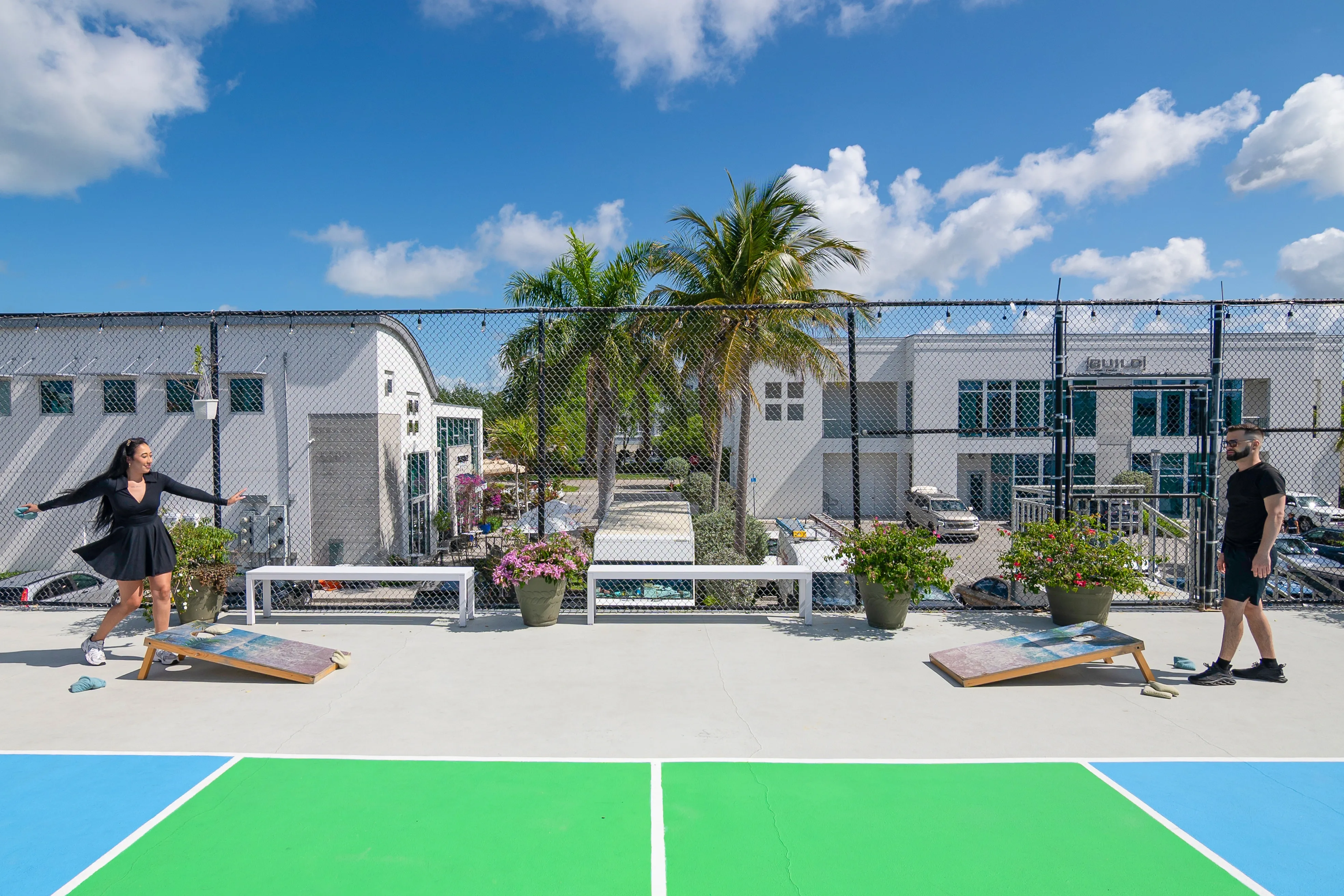 Guests Playing Cornhole